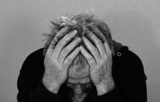 When Loneliness Pays Off: The Economics of Loneliness in the Digital Age